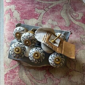 White Ceramic Knob with Gold Sunburst Accent.   Set of 8